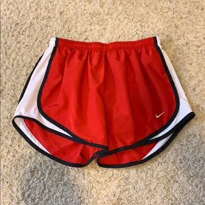 Red Nike running shorts